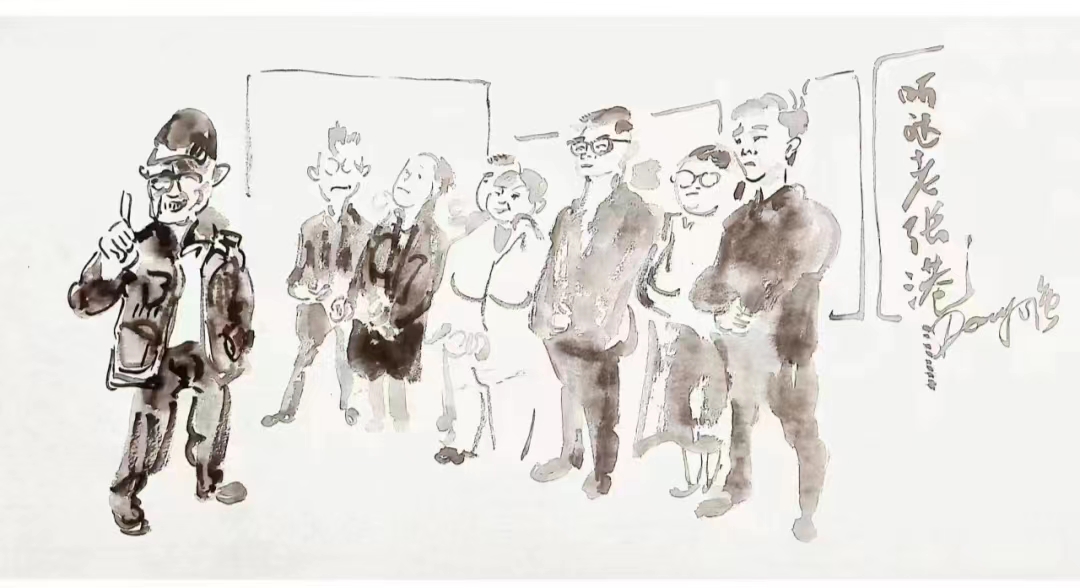 益陽籍畫家在“僑界領袖張國基墨跡展”現場作漫畫